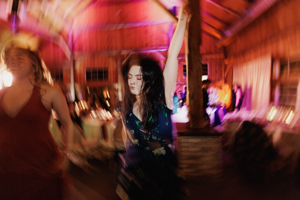 Wedding Attendee lost in the music on the dancefloor at Stonewall Estates