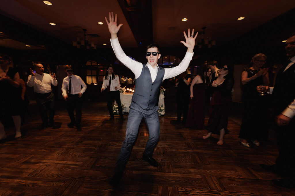 Groom dancing at wedding at Pillar & Post Niagara on the Lake